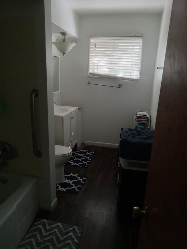 310 New Salem St, Park Forest, IL 60466 - full bathroom with vanity, wood finished floors, toilet, and  shower combination