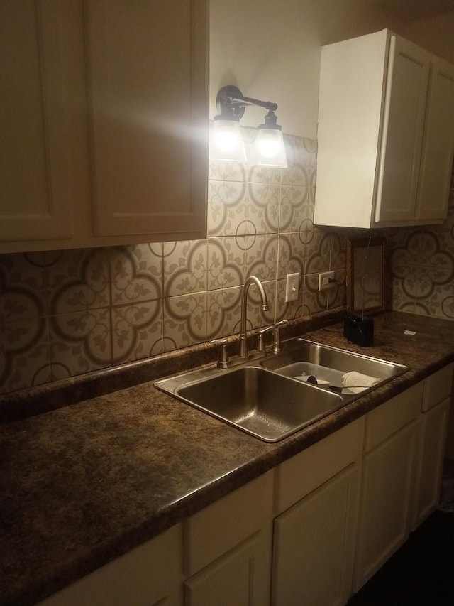 310 New Salem St, Park Forest, IL 60466 - kitchen with a sink, white cabinets, and dark countertops