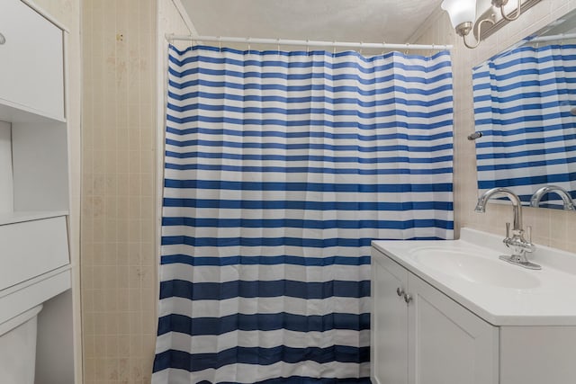 201 S 1st St, Tolono, IL 61880 - full bath featuring vanity and a shower with curtain