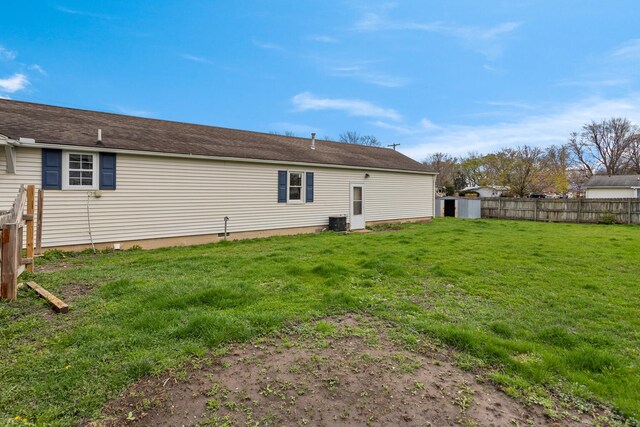 201 S 1st St, Tolono, IL 61880 - rear view of property featuring cooling unit