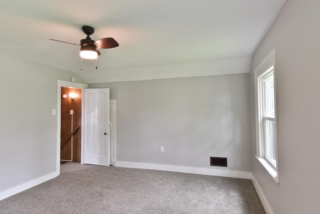 417 E Vermillion St, Odell, IL 60460 - empty room featuring baseboards, carpet, and plenty of natural light