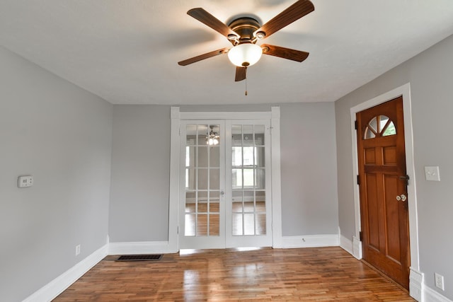 417 E Vermillion St, Odell, IL 60460 - entryway featuring ceiling fan, wood finished floors, and baseboards
