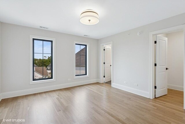 5906 Juniper Ct, Western Springs, IL 60558 - unfurnished bedroom with light wood-style flooring and baseboards