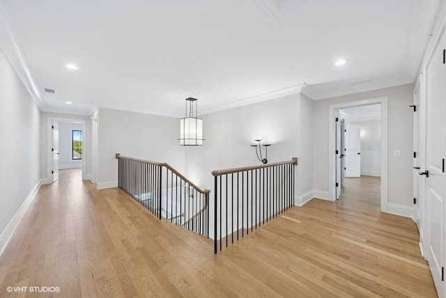 5906 Juniper Ct, Western Springs, IL 60558 - hall featuring an upstairs landing, ornamental molding, light wood-type flooring, recessed lighting, and baseboards