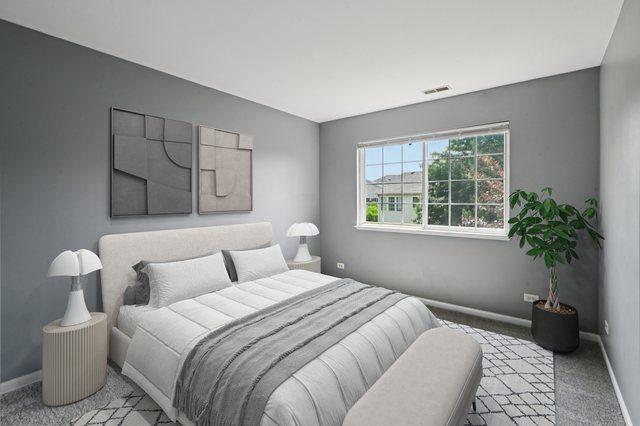3736 Munson St, Plano, IL 60545 - bedroom featuring carpet floors and baseboards