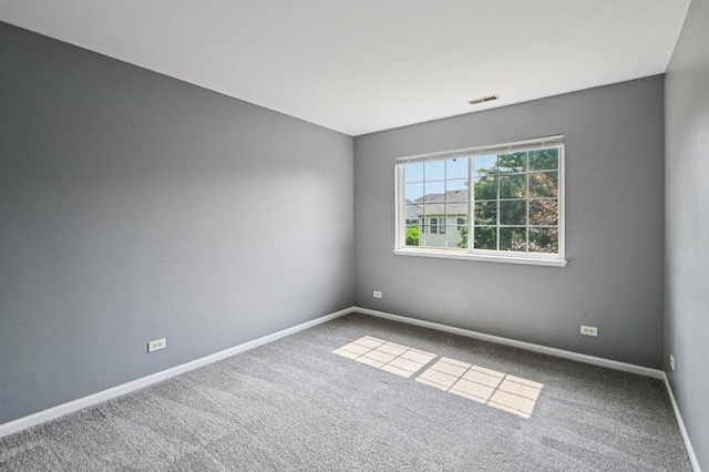 3736 Munson St, Plano, IL 60545 - carpeted empty room with baseboards