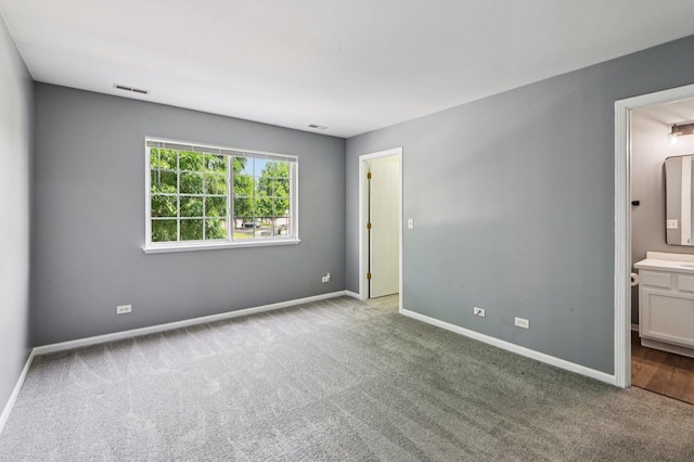 3736 Munson St, Plano, IL 60545 - unfurnished bedroom with carpet floors and ensuite bath