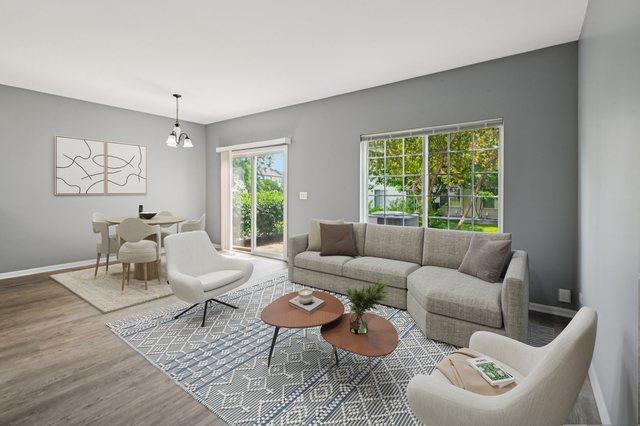 3736 Munson St, Plano, IL 60545 - living room with baseboards and wood finished floors