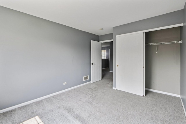 3736 Munson St, Plano, IL 60545 - unfurnished bedroom featuring carpet flooring and a closet