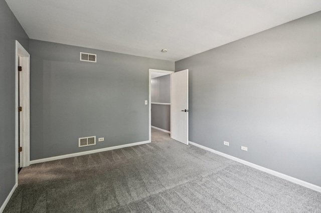 3736 Munson St, Plano, IL 60545 - empty room featuring carpet flooring and baseboards