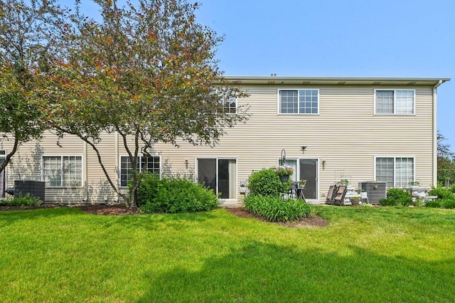3736 Munson St, Plano, IL 60545 - rear view of property with a lawn