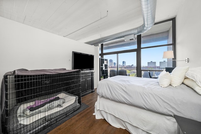 1530 S State St Unit 722, Chicago, IL 60605 - bedroom with wood finished floors and a wall of windows