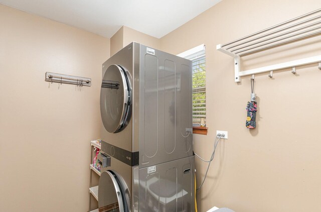 2519 Quail Cv, Carpentersville, IL 60110 - laundry area featuring stacked washing machine and dryer