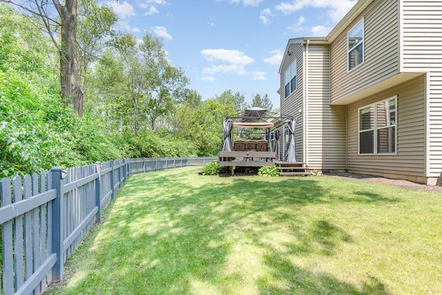 2519 Quail Cv, Carpentersville, IL 60110 - fenced backyard featuring a gazebo and a deck