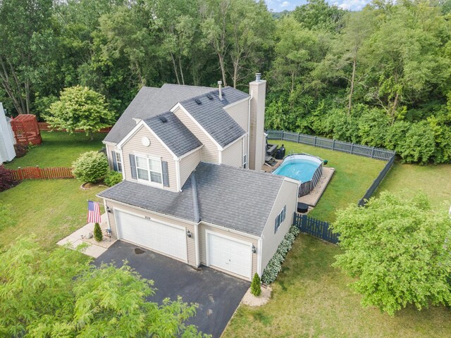 2519 Quail Cv, Carpentersville, IL 60110 - view from above of property featuring a heavily wooded area