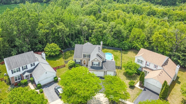 2519 Quail Cv, Carpentersville, IL 60110 - view from above of property featuring a heavily wooded area
