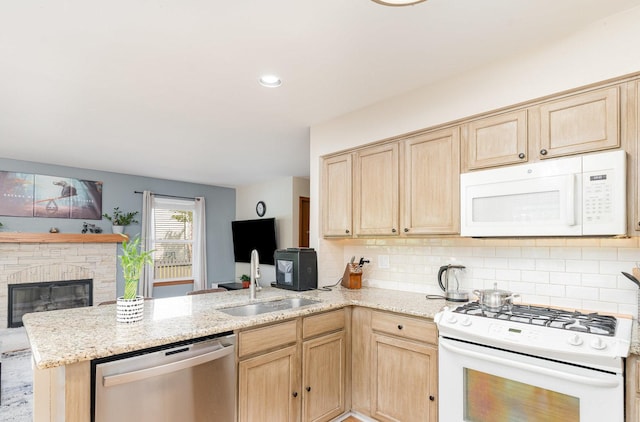 2519 Quail Cv, Carpentersville, IL 60110 - kitchen with white appliances, light brown cabinets, a peninsula, open floor plan, and backsplash