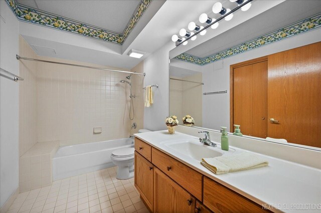 455 W Front St Unit 307, Wheaton, IL 60187 - bathroom featuring vanity, shower / washtub combination, and tile patterned flooring