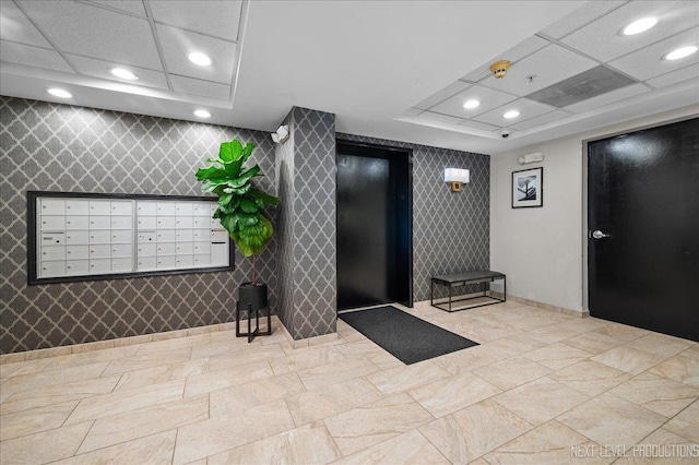 455 W Front St Unit 307, Wheaton, IL 60187 - building lobby featuring wallpapered walls and recessed lighting