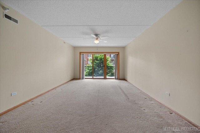 455 W Front St Unit 307, Wheaton, IL 60187 - carpeted spare room with ceiling fan, a textured ceiling, and a smoke detector