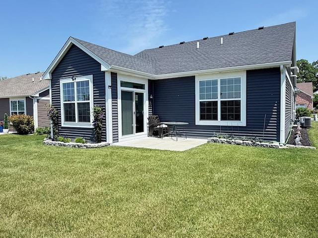 1112 Black Cherry Dr, Crystal Lake, IL 60012 - rear view of house with central AC, a lawn, a patio area, and roof with shingles