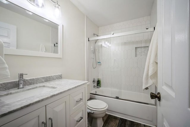 2009 Ammer Ridge Ct Unit 102, Glenview, IL 60025 - bathroom featuring vanity, wood finished floors, and enclosed tub / shower combo