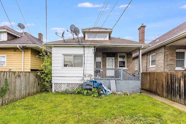 8011 S Ada St, Chicago, IL 60620 - view of front facade with a fenced backyard and a porch