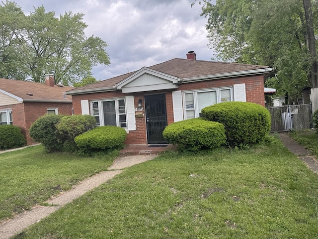 14915 Irving Ave, Dolton, IL 60419 - bungalow-style house featuring brick siding and a chimney
