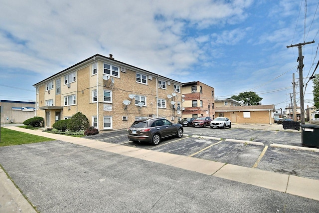 7321 W Fullerton Ave Unit 10, Elmwood Park, IL 60707 - view of property featuring uncovered parking