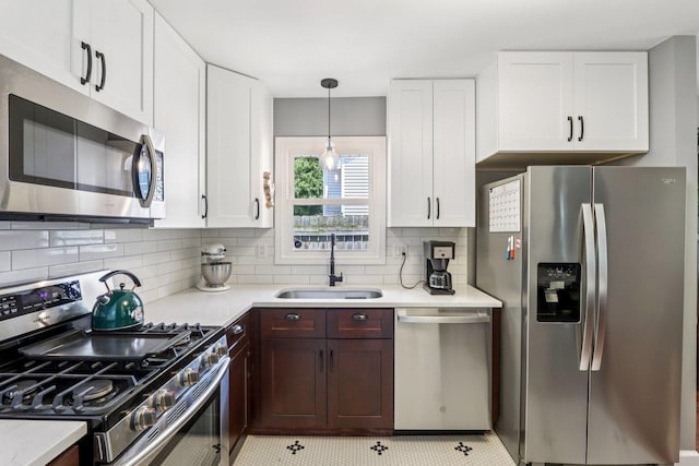 N074 Nepil Ave, Wheaton, IL 60187 - kitchen with stainless steel appliances, tasteful backsplash, and white cabinets