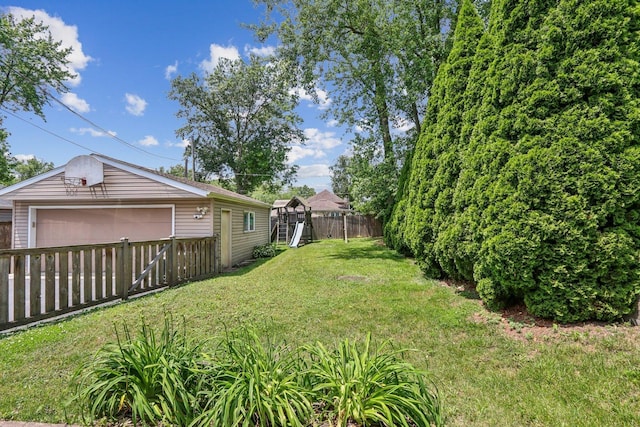 N074 Nepil Ave, Wheaton, IL 60187 - fenced backyard featuring a detached garage