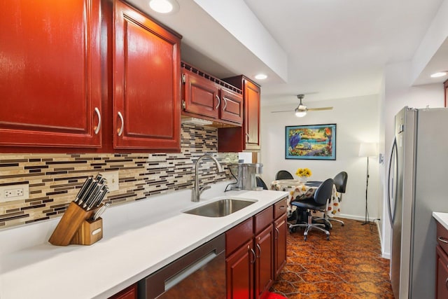 9346 Landings Ln Unit 506, Des Plaines, IL 60016 - kitchen with appliances with stainless steel finishes, a sink, reddish brown cabinets, a ceiling fan, and recessed lighting