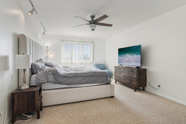 9346 Landings Ln Unit 506, Des Plaines, IL 60016 - bedroom featuring rail lighting, ceiling fan, and baseboards