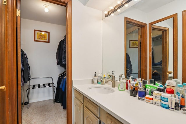 9346 Landings Ln Unit 506, Des Plaines, IL 60016 - bathroom featuring vanity and speckled floor
