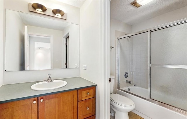12900 W Heiden Cir Unit 4301, Lake Bluff, IL 60044 - bathroom with vanity, bath / shower combo with glass door, and a textured ceiling
