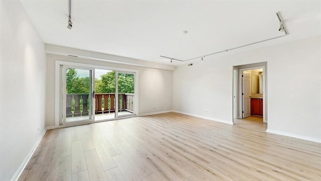 12900 W Heiden Cir Unit 4301, Lake Bluff, IL 60044 - spare room with rail lighting and light wood-style flooring