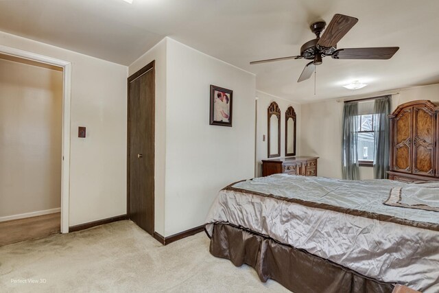 371 Elm St, Elgin, IL 60123 - bedroom with light carpet, a ceiling fan, and a closet