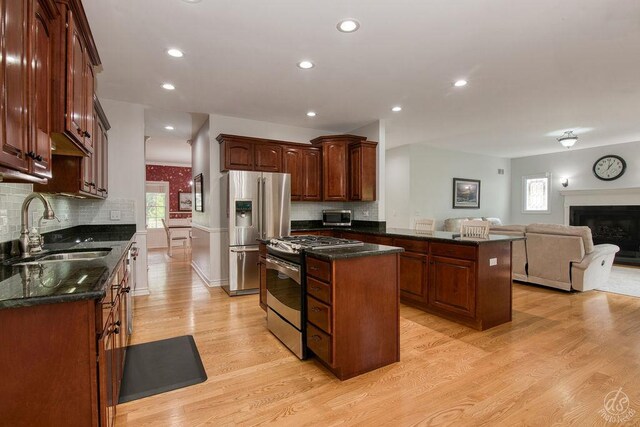 141 Mary Hamsmith Ct, Sycamore, IL 60178 - kitchen with stainless steel appliances, a sink, a kitchen island, healthy amount of natural light, and recessed lighting