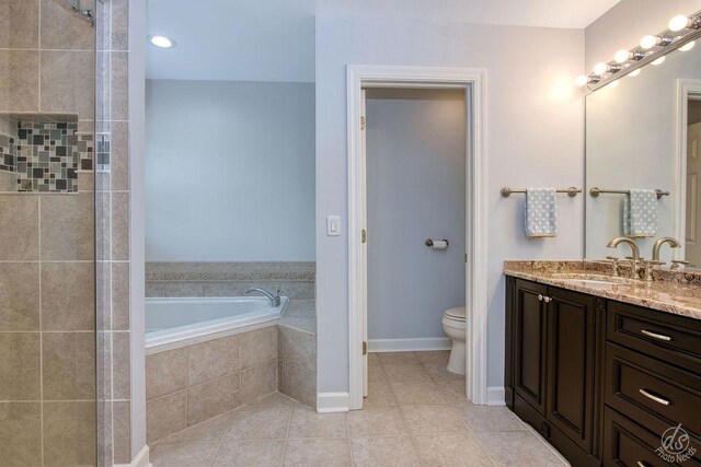 141 Mary Hamsmith Ct, Sycamore, IL 60178 - full bathroom with vanity, a garden tub, tile patterned floors, toilet, and a tile shower