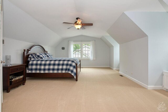 141 Mary Hamsmith Ct, Sycamore, IL 60178 - bedroom featuring light colored carpet, baseboards, lofted ceiling, and a ceiling fan