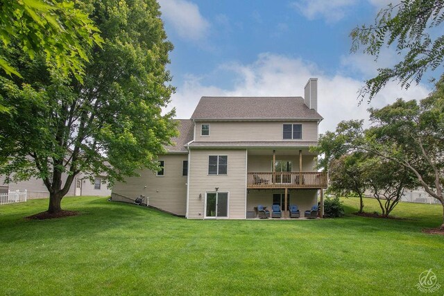 141 Mary Hamsmith Ct, Sycamore, IL 60178 - back of property with a yard, a chimney, and a wooden deck