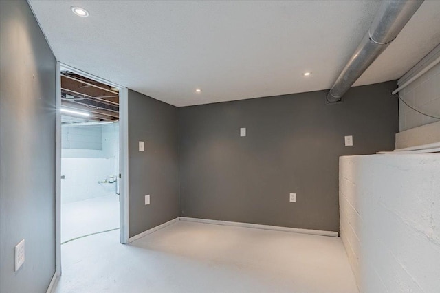 800 E Webster St, Clinton, IL 61727 - empty room featuring recessed lighting and concrete floors