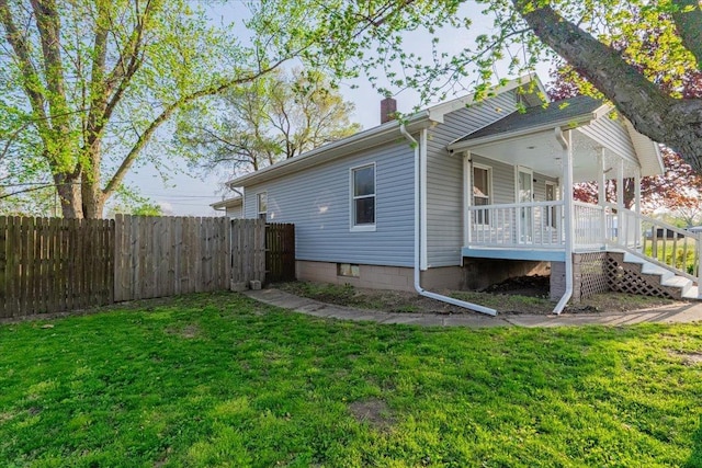 800 E Webster St, Clinton, IL 61727 - view of side of home with a chimney, a porch, and stairs