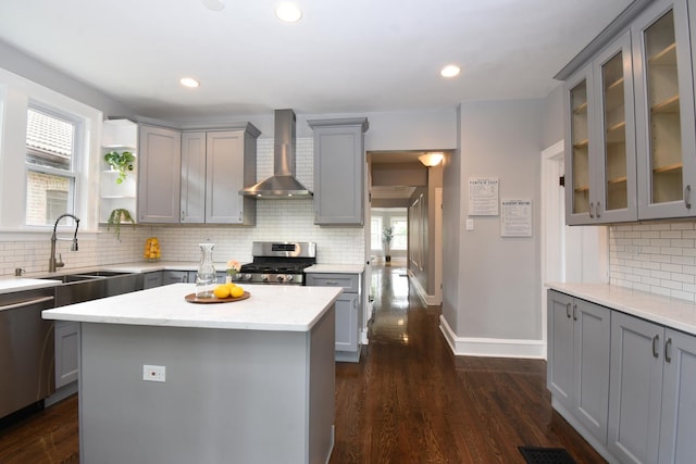 1234 Edmer Ave, Oak Park, IL 60302 - kitchen featuring wall chimney range hood, gray cabinets, stainless steel appliances, decorative backsplash, and recessed lighting