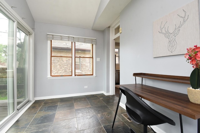 1234 Edmer Ave, Oak Park, IL 60302 - dining area featuring stone tile flooring and baseboards