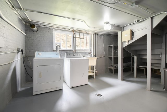 1234 Edmer Ave, Oak Park, IL 60302 - basement featuring washer and clothes dryer and a sink