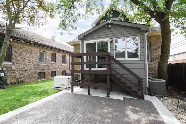 1234 Edmer Ave, Oak Park, IL 60302 - back of property featuring a patio area and brick siding