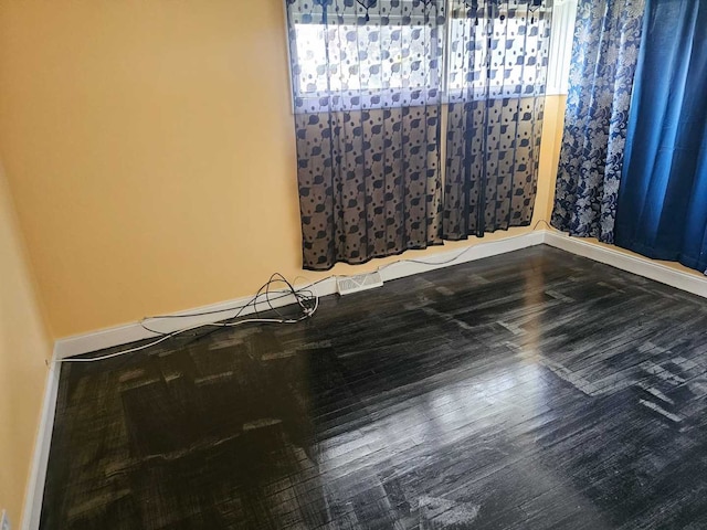 3014 W 163rd St, Markham, IL 60428 - empty room featuring wood finished floors and baseboards