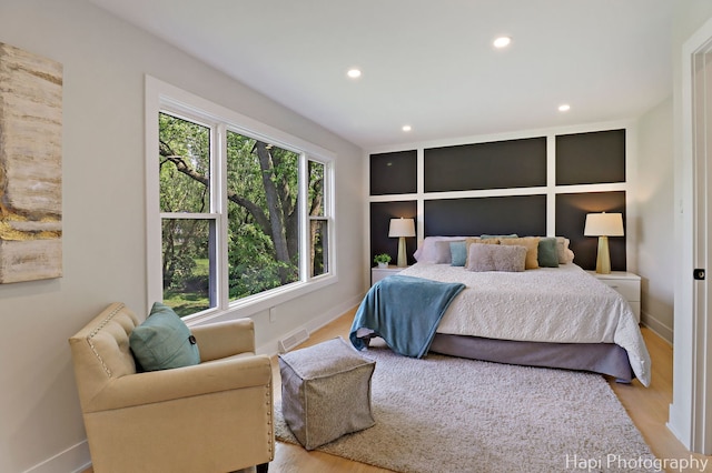 539 S Plum Grove Rd, Palatine, IL 60067 - bedroom with baseboards, recessed lighting, and light wood finished floors