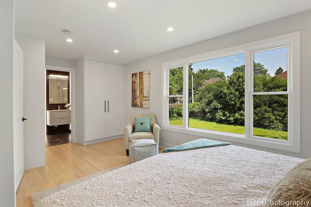 539 S Plum Grove Rd, Palatine, IL 60067 - bedroom with recessed lighting, light wood-style flooring, connected bathroom, and baseboards